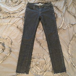 Soft, dark wash skinny jeggings with raw hem